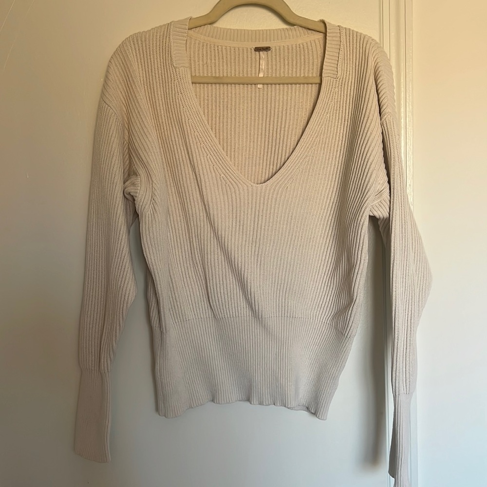 Cream colored v-neck sweater